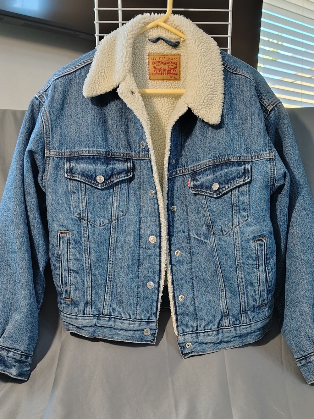 Levi's Blue Denim Trucker Jacket with Cream Sherpa Collar